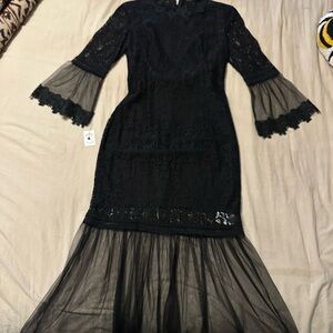 Elegant Black Lace Maxi Dress with Sheer Mermaid Hem